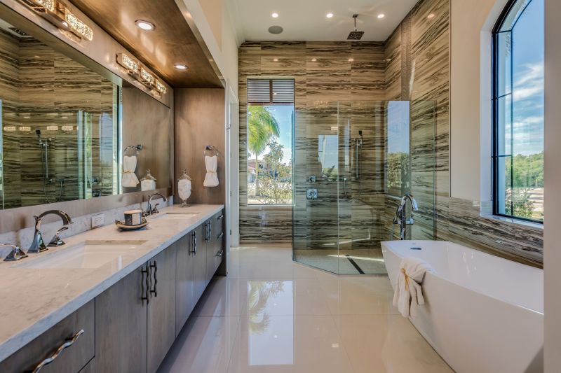 Spacious Master Bathroom with Natural Stone Floors